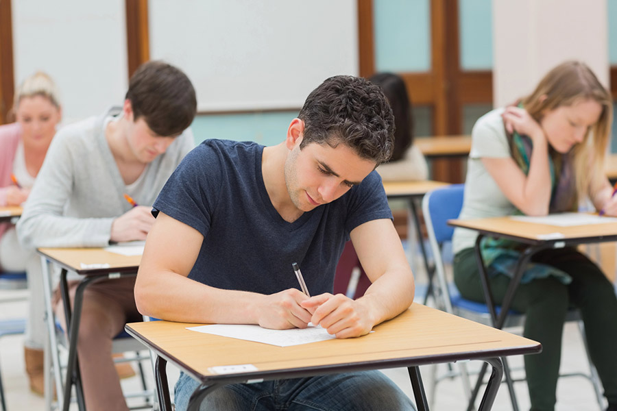 Students taking a test in a classroom in Durham